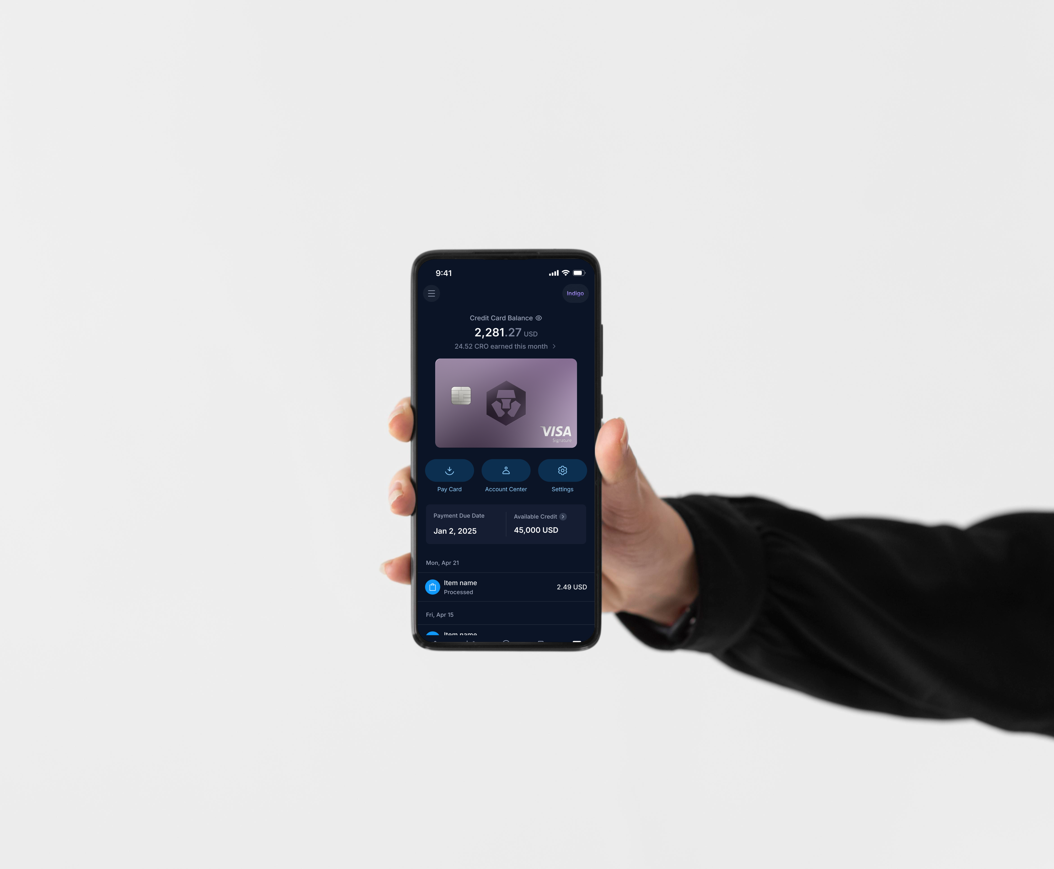 Crypto.com credit card mobile interface held in hand on a light project preview.